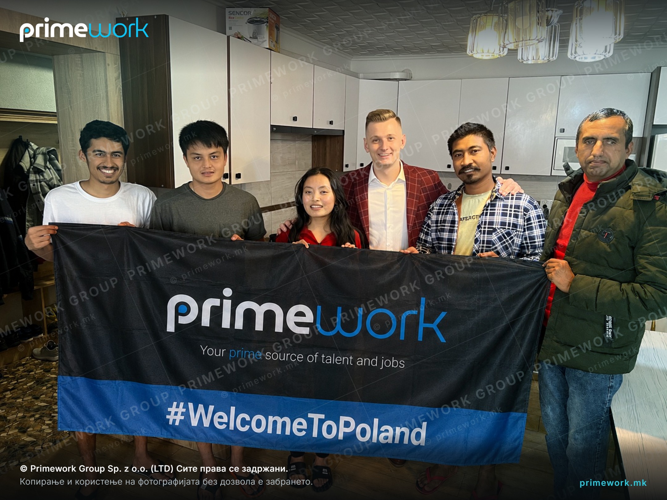 A Primework Group coordinator with workers in the kitchen of organised accommodation