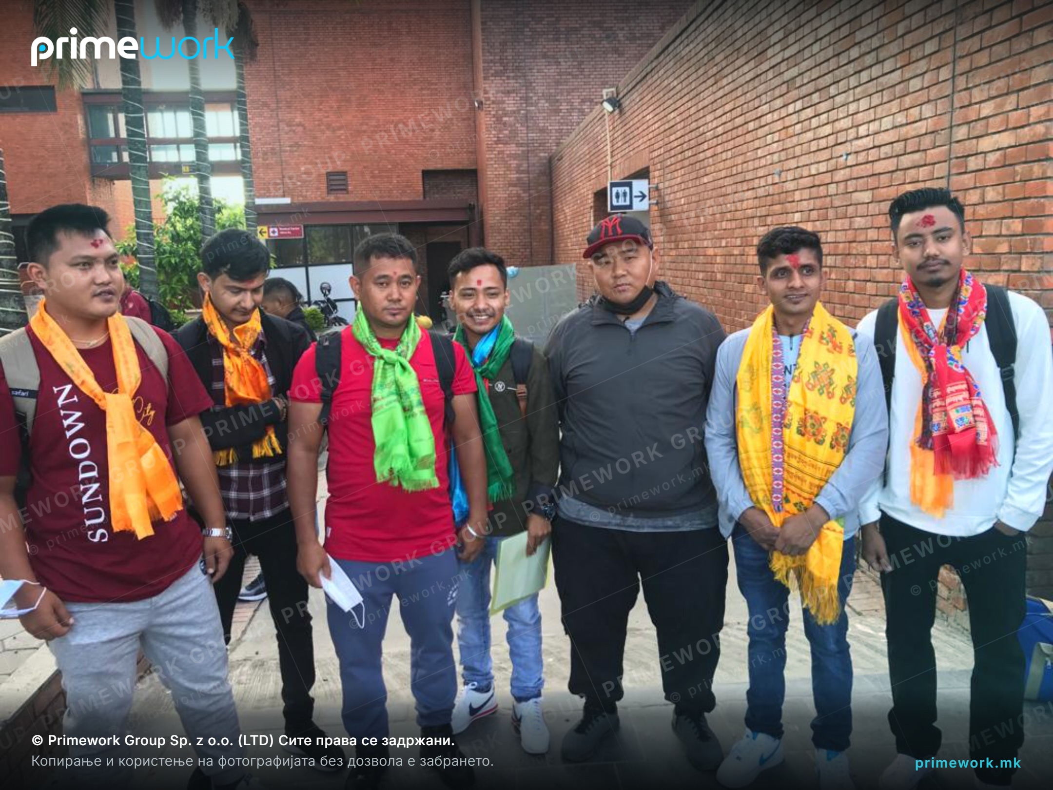 Seeing off a group of Nepali workers in front of the Kathmandu terminal