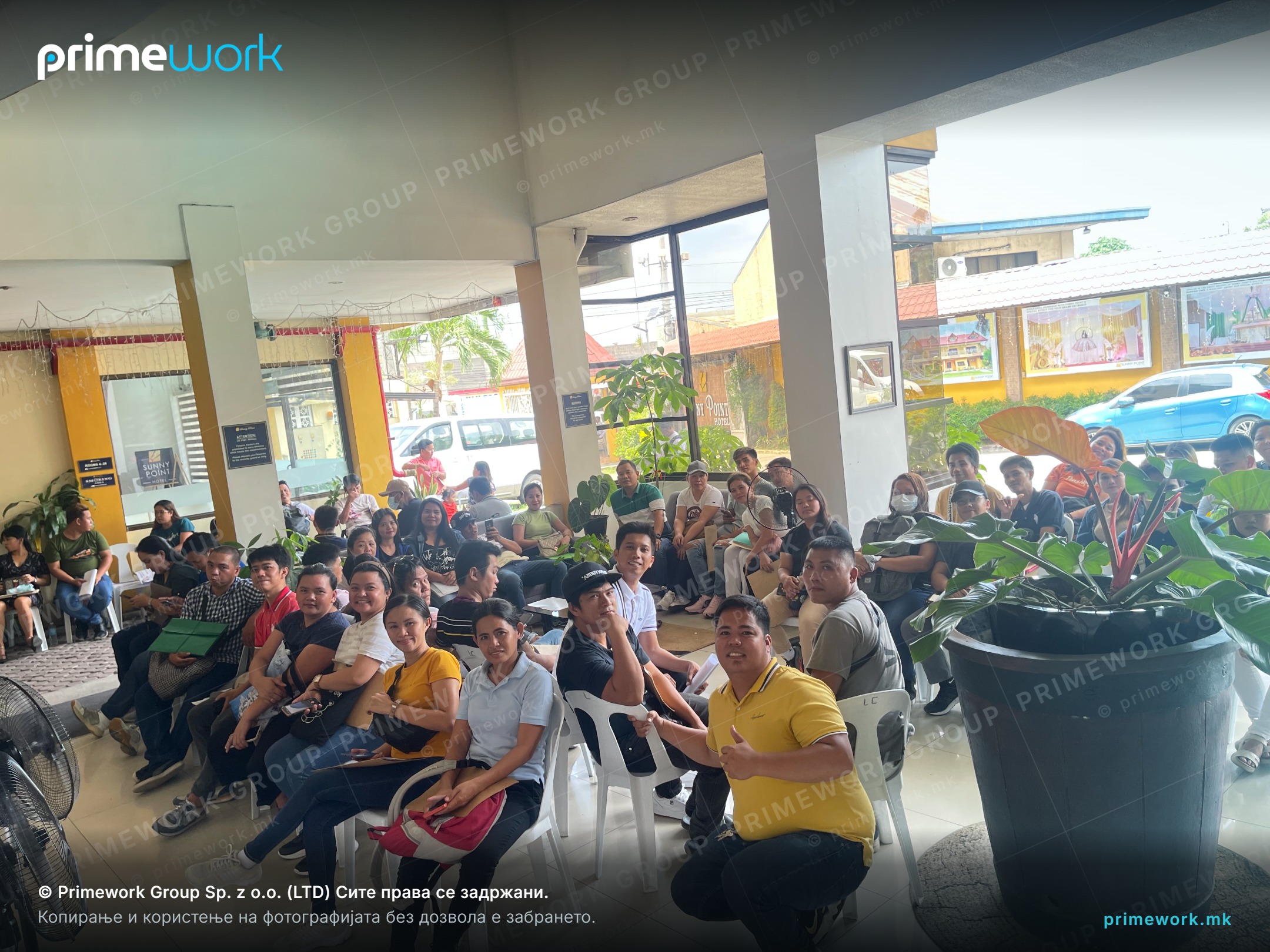 A full waiting room of candidates in a recruitment centre